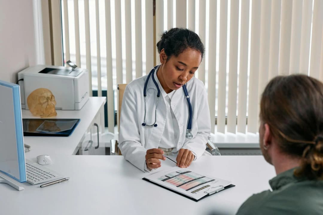 A patient consulting with a bariatric surgeon